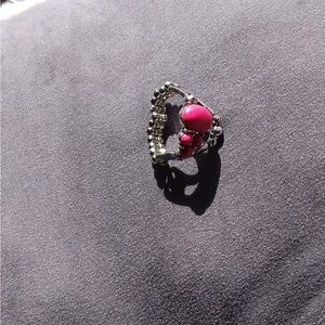 Silver ring with pink stones